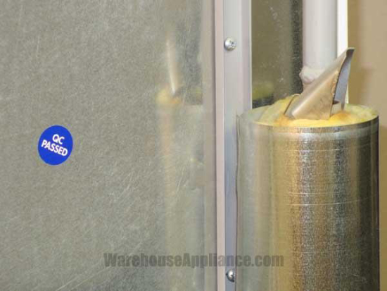 Exhaust flue at the back of the EZ Freeze Gas Refrigerators